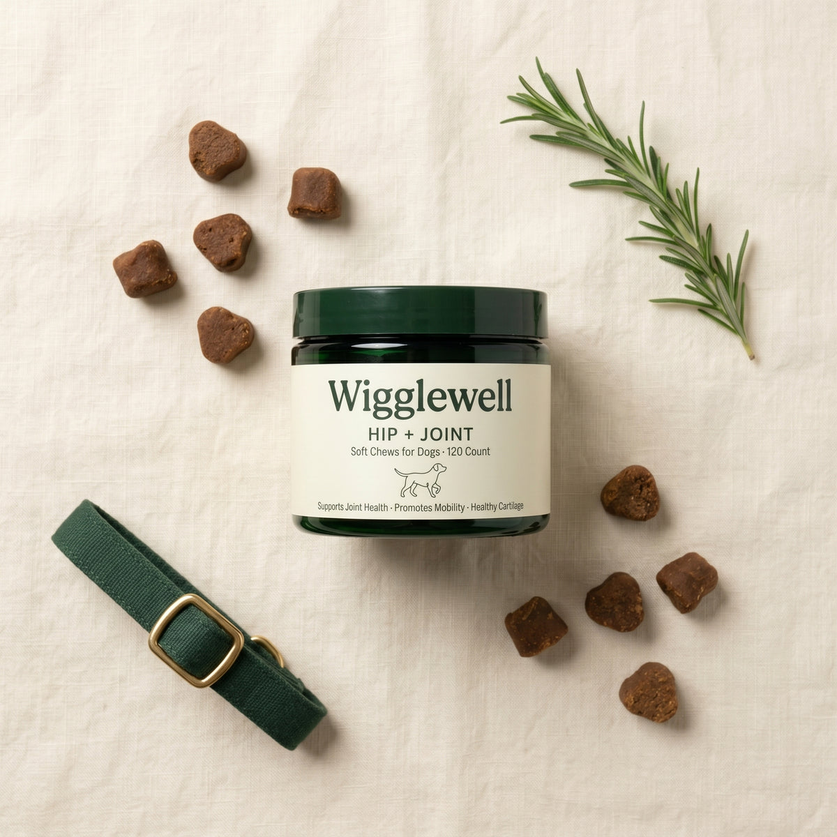 Wigglewell Hip + Joint Soft Chews � flat lay with chews and rosemary